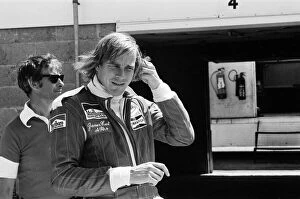 Images Dated 17th July 1976: James Hunt puts his new car, the Marlborough-McLaren M.26