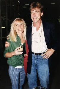 Motorsport Gallery: James Hunt racing driver with arm around Helen Dyson
