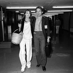 Images Dated 25th April 1977: Jane Birkin April 1977 And her husband Serge Gainsbourg arriving at Heathrow
