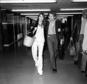 Images Dated 25th April 1977: Jane Birkin April 1977 And her husband Serge Gainsbourg arriving at Heathrow
