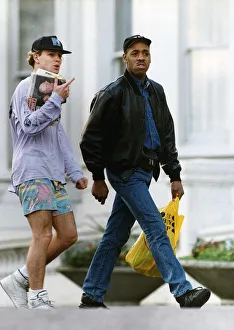 Images Dated 11th November 1990: Jason Donovan Actor / Singer walking along with minder Barrie Knight