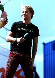 Jason Donovan at Radio 1 roadshow Irvine beach park black t shirt Hustler tartan trousers Jason Donovan at Radio 1 roadshow Irvine beach park black t shirt Hustler tartan trousers