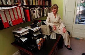 Images Dated 22nd May 1998: Jayne Irving TV Presenter July 1998 At home sitting on her desk A©mirrorpix