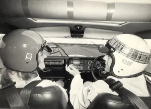 Jean Rook Daily Express reporter with Jackie Stewart at Silverstone race circuit hanger Jean Rook Daily Express reporter with Jackie Stewart at Silverstone race circuit hanger