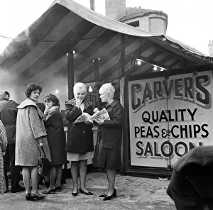 East Yorkshire Gallery: Jeanne Stather (22) and Jennifer Fussey (19) enjoy lunch time chips from the open air