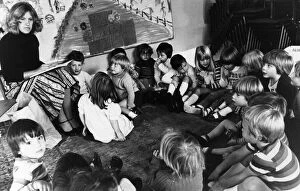 Jennifer Whyte reads the youngsters a story in a Cambridge Nursery, September 1978
