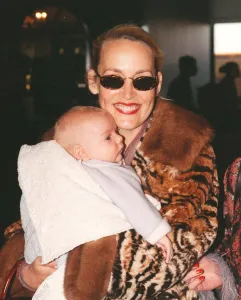 Jerry Hall with baby Gabriel March 1998 At Heathrow Airport Jerry Hall with baby Gabriel March 1998 At Heathrow Airport