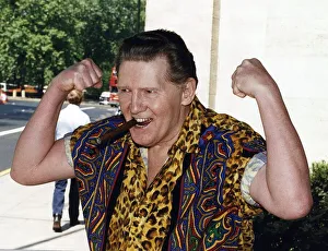 Jerry Lee Lewis American Rock and Roll Singer with a cigar Jerry Lee Lewis American Rock and Roll Singer with a cigar