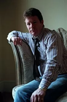 Images Dated 16th October 1998: Jim Davidson Comedian / TV Presenter October 1998 Sitting on sofa at home