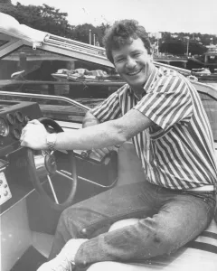 Jim Davidson at the wheel of his Princess boat on Torquay Marina20th July1987 Jim Davidson at the wheel of his Princess boat on Torquay Marina20th July1987