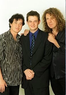 Images Dated 12th October 1998: Jimmy Page former lead guitarist of the pop group Lead Zeppelin with Robert Plant former