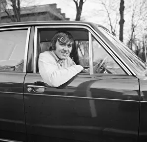 Images Dated 22nd January 1970: Jimmy Rimmer of Manchester United sitting in his car