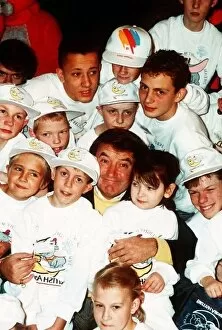 Images Dated 1st November 1988: Jimmy Tarbuck TV Presenter Comedian at Heathrow with handicapped children who are on a
