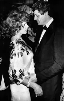 Joan Collins the actress with Muck Flick at a late night disco in May 1984 Joan Collins the actress with Muck Flick at a late night disco in May 1984