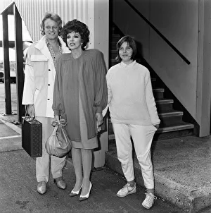 Joan Collins arrives at LAP from Los Angeles with her boyfriend Peter Holm Joan Collins arrives at LAP from Los Angeles with her boyfriend Peter Holm
