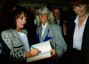 Joan Collins signing book for Nancy Smith June 1989 Joan Collins signing book for Nancy Smith June 1989