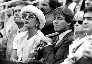 Joan Collins and Bill Wiggins at Queens Club for tennis tournament - June 1987