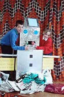 Images Dated 9th October 1991: Jodie Asquith and Richard Lomas add to the harvest collection at Scholes Junior
