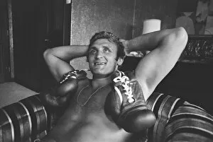 Images Dated 1st July 1975: Joe Bugner v. Muhammad Ali in Kuala Lumpar. Bugner relaxes in his hotel after