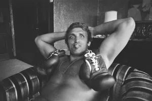 Images Dated 1st July 1975: Joe Bugner v. Muhammad Ali in Kuala Lumpar. Bugner relaxes in his hotel after