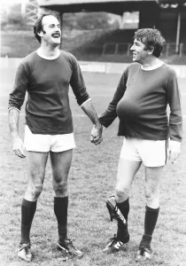 John Cleese Actor with fellow Actor Peter Cook at a Charity Football Match John Cleese Actor with fellow Actor Peter Cook at a Charity Football Match