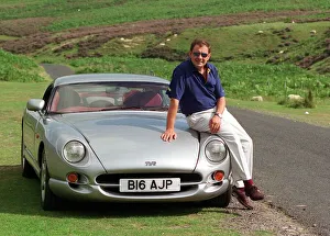 John Clelland sitting on a silver grey TVR Cerbera car August 1997 B16 AJP John Clelland sitting on a silver grey TVR Cerbera car August 1997 B16 AJP