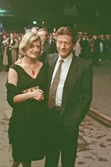 Images Dated 2nd March 1989: John Hurt and his partner Jo Dalton arrive at The Odeon Leicester Square