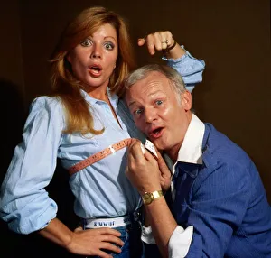 John Inman measuring Penny Irving August 1979 John Inman measuring Penny Irving August 1979