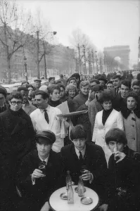 John Lennon, Paul McCartney and George Harrison bring the Champs-Elysees to a standstill John Lennon, Paul McCartney and George Harrison bring the Champs-Elysees to a standstill