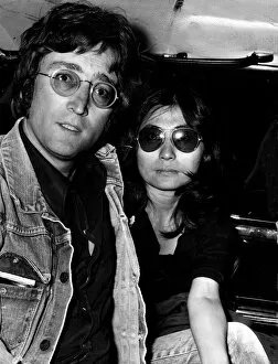 JOHN LENNON AND YOKO ONO IN LIMO AFTER ARRIVING AT LAP FROM MAJORCA
