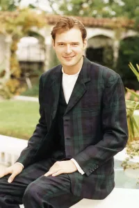 John Leslie TV Presenter sitting wearing tartan suit John Leslie TV Presenter sitting wearing tartan suit
