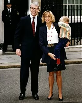Images Dated 29th July 1993: John Major is pictured outside No. 10 Downing Street this morning with three year old