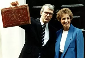 John Major seen here as Chancellor holding up the red budget box with wife Norma Major