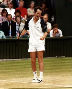 Images Dated 10th July 1989: John McEnroe tennis champion in action angry with himself
