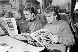 John Scales (left - reading The Evening Standard) travelling on the team coach John Scales (left - reading The Evening Standard) travelling on the team coach