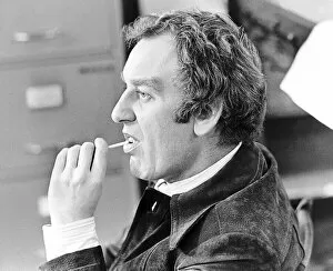 John Thaw during filming of The Sweeney 1975 with lollipop sweet