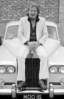 Images Dated 17th September 1978: Johnny Speight TV Script Writer - sitting on the bonnet of his Rolls Royce A©