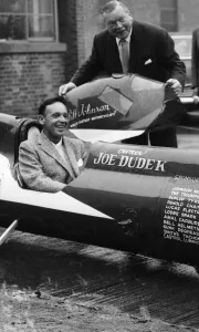Bill Johnson seen here with his specially built Triumph motorcycle in which he broke Bill Johnson seen here with his specially built Triumph motorcycle in which he broke