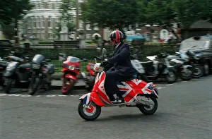 Jonathon Ross TV Presenter August 1998 Riding his Union Jack painted Vespa scooter Jonathon Ross TV Presenter August 1998 Riding his Union Jack painted Vespa scooter