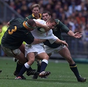 Images Dated 24th October 1999: Jonny Wilkinson Rugby Union Player of England Oct 1999 being tackled during