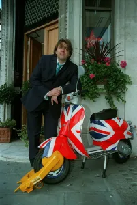 Jonothan Ross TV Presenter August 1998 With his Union Jack painted Vespa Scooter Jonothan Ross TV Presenter August 1998 With his Union Jack painted Vespa Scooter