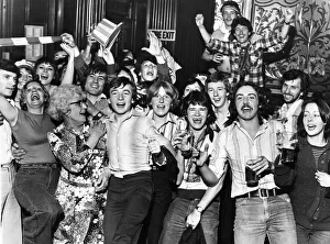 Jubilant Liverpool fans in triumphant mood, singing and celebrating at a local pub as Jubilant Liverpool fans in triumphant mood, singing and celebrating at a local pub as