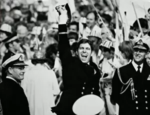 Images Dated 17th September 1982: Jubilant Prince Andrew ashore with proud father Prince Philip after the carrier HMS