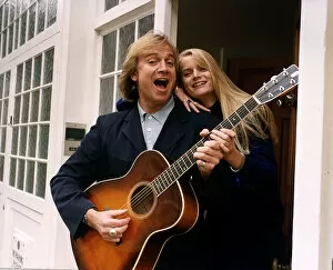 Images Dated 13th November 1991: Justin Hayward lead singer of the moody blues plays guitar with his daughter Doremi