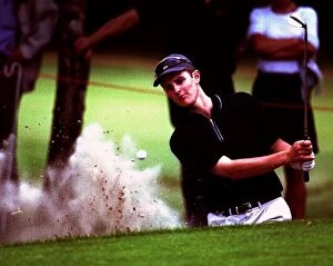 Images Dated 23rd July 1998: Justin Rose plays out of a greenside bunker on the 15th hole during the Dutch Open Golf