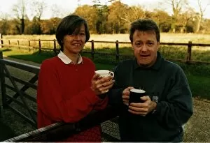 Images Dated 27th November 1992: Keith Chegwin TV Presenter drinking tea outside in garden with woman name not known