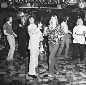 Images Dated 17th March 1978: Keith Moon, drummer of The Who rock group, pictured with his girlfriend Annette dancing