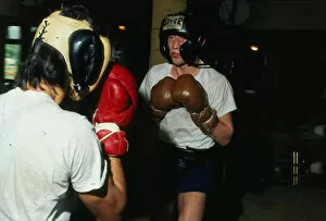 Ken Buchanan boxer 1980 Sparring wearing boxing gloves protective helmet