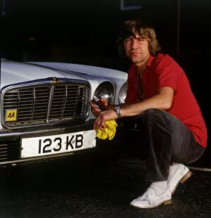 Ken Buchanan boxer cleaning his car November 1986