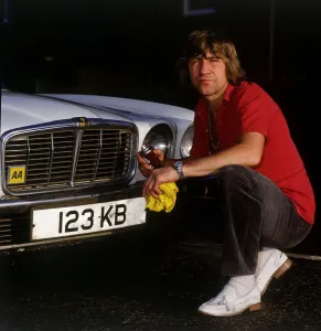 Ken Buchanan boxer cleaning his car November 1986 Ken Buchanan boxer cleaning his car November 1986